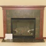 Traditional Style Fireplace with tile and Wood