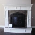Traditional Style Fireplace with Tile and Wood