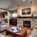 Contemporary stone fireplace with mantel, design installation by La Crosse Fireplace