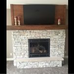 Heat & Glo 6000CLX with Halston front and Berkshire Buff Estate Stone with custom mantel and shiplap