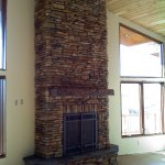 Aspen stone fireplace installation by La Crosse Fireplace