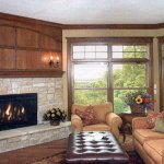 Stone fireplace with hearth, design installation by La Crosse Fireplace