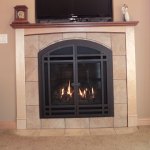 Traditional Style Fireplace with Tile and Mantle