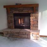 Stone fireplace with mantel installation La Crosse WI