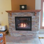 Rustic stone fireplace installed by La Crosse Fireplace