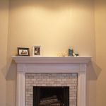 Traditional Style Fireplace Brick and Painted Wood