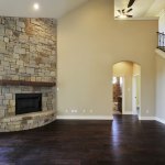 Traditional stone fireplace with mantel, installation by La Crosse Fireplace