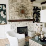 Modern stone fireplace with mantel, design installation by La Crosse Fireplace