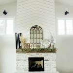 Fireplace with shiplap above
