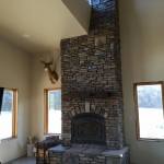 Stone fireplace multi-story