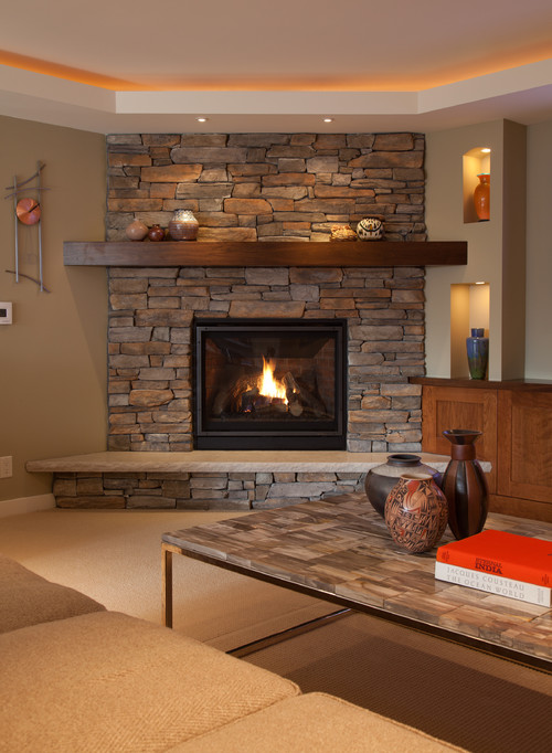 Indoor stone fireplace by La Crosse Fireplace