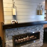 Kozy Heat Calloway 50 gas fireplace with pewter stackstone and custom wrap around mantel