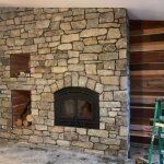 Quadra-Fire 7100fp wood fireplace with Canyon Creek stone veneer