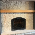 Heat-n-Glo Cerona 42 gas fireplace with Halquist Fond du Lac Buff Ledgestone