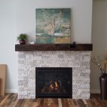 Latte Accent Stone with barn beam mantel