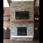 Heat-n-Glo gas fireplace with Greystone gold estate stone