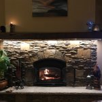 Quadra-Fire wood fireplace with Cinnamon Bark ledgestone and fieldstone mix