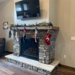Side view of wrap around mantel with Montecito Cliffstone