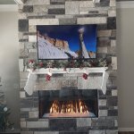 Stellar see-thru gas fireplace with custom stone