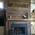 Slate surround with rustic ship lap wall