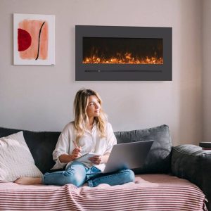 Woman Sitting Near Electric Fireplace